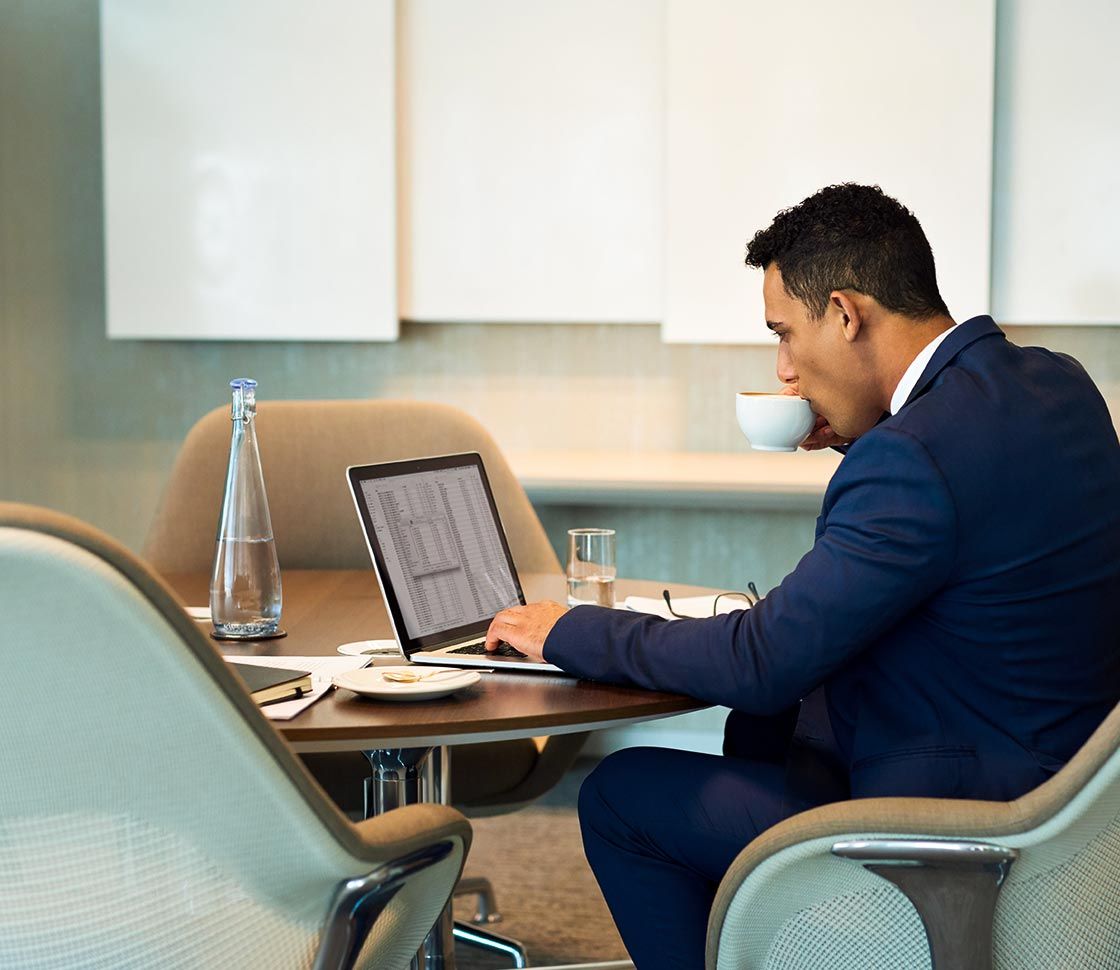 A businessman working on a laptop