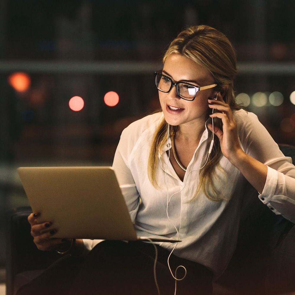 A business woman collaborating with work colleagues